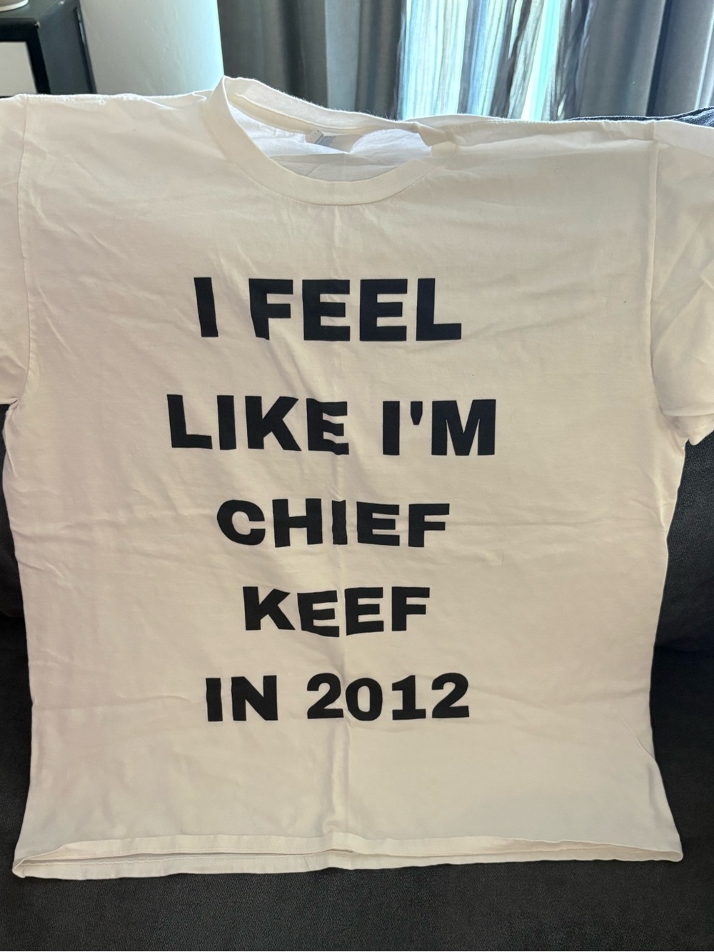 White Graphic Tee with Bold Black Text